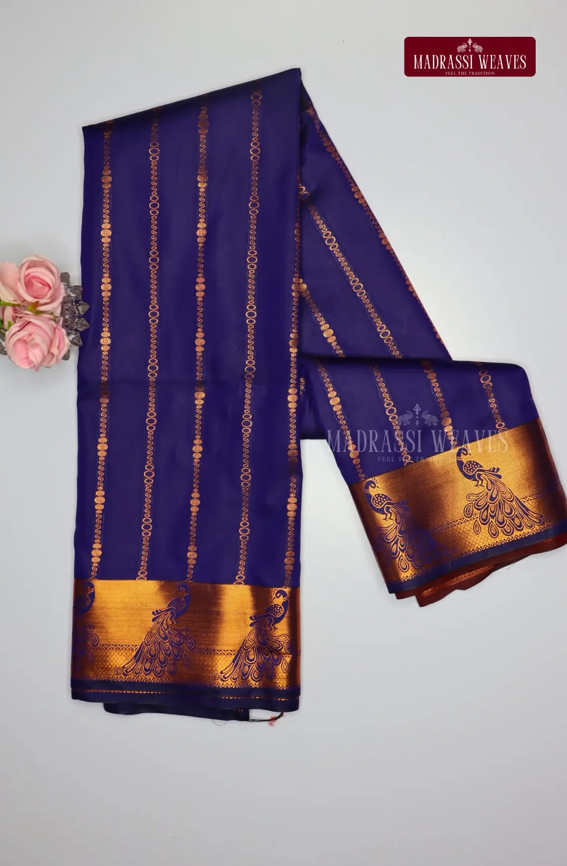 Looking for a gorgeous saree for a special occasion? Look no further! Our Kanchi Semi Silk Saree features a stunning peacock border and intricate all over kodi pattern, making it the perfect festive wear. With attached blouse material and free shipping, this beautiful blue saree is the best deal you'll find!