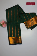 Looking for a gorgeous saree for a special occasion? Look no further! Our Kanchi Semi Silk Saree features a stunning peacock border and intricate all over kodi pattern, making it the perfect festive wear. With attached blouse material and free shipping, this beautiful blue saree is the best deal you'll find!