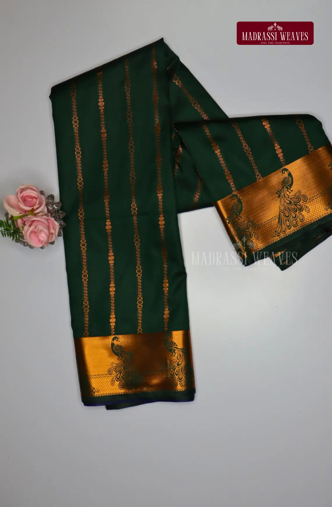 Looking for a gorgeous saree for a special occasion? Look no further! Our Kanchi Semi Silk Saree features a stunning peacock border and intricate all over kodi pattern, making it the perfect festive wear. With attached blouse material and free shipping, this beautiful blue saree is the best deal you'll find!