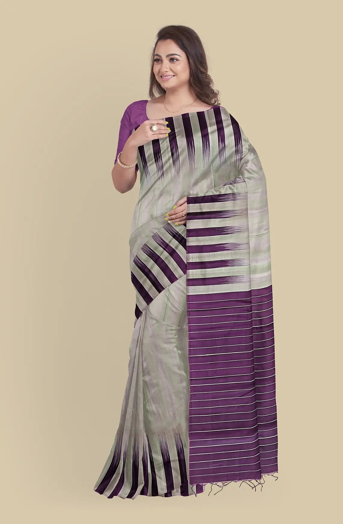 Discover the exquisite craftsmanship of Kanjeevaram Pure Silk Saree - Tussar Magenta. Made from pure silk, this saree features intricate meena butta work and zari weaving for a luxurious feel. Certified by Silk Mark, it's the perfect choice for weddings. Includes attached blouse material. Buy online now.