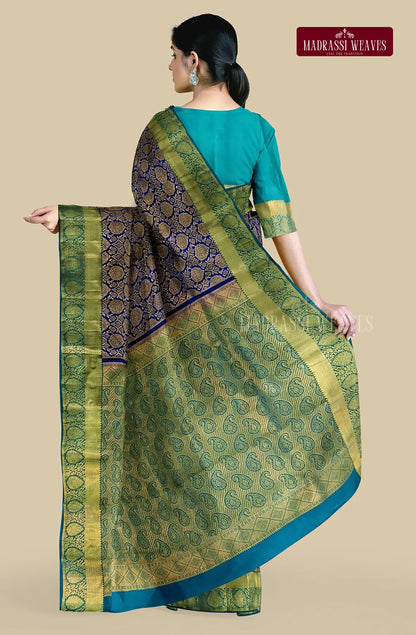 Experience the luxurious elegance of our Kanjeevaram Pure Silk Saree in beautiful Violet. Adorned with intricate Meena Butta work and stunning Zari woven design, this saree is Silk Mark certified and perfect for weddings. Blouse material attached, buy online now to elevate your saree collection!