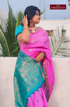 Indulge in timeless elegance with our Semi Kanji Silk Saree. The delicate pinkish lavender hue, accented with a shimmering Zari border and intricate butta design, makes it perfect for special occasions and weddings. Plus, the attached blouse material and easy online purchase option make it a must-have!