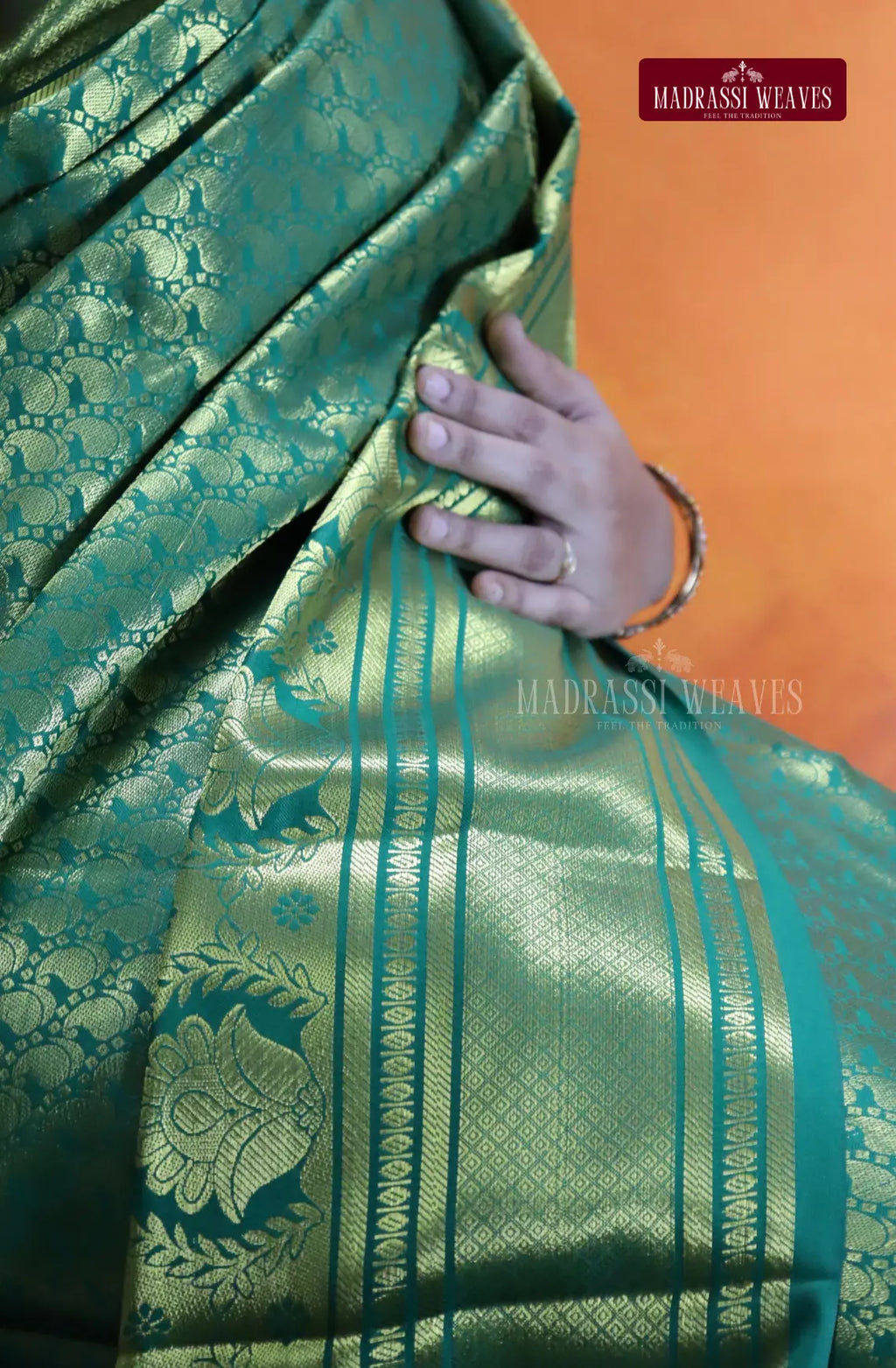 Experience elegance and tradition with our Semi Silk Kanjeevaram Brocade Saree. This stunning saree boasts a rich brocade design and comes in 16 beautiful colors. The attached blouse material makes it perfect for any occasion. Shop now to add this must-have piece to your wardrobe!
